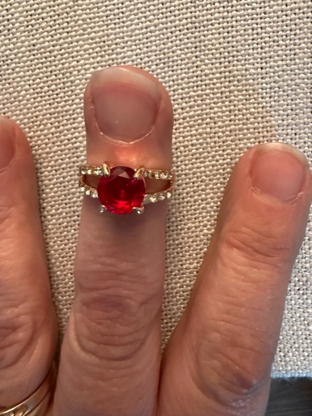 Gold Ring with Red Center Stone and Pavé Accents